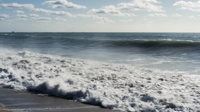 Crashing ocean wave at shore.