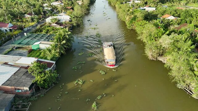 Thanh My and My Loi, Dong Thap province (Tien Giang), Mekong Delta, Vietnam: 4K aerial drone footage of canal waterways, rural houses, boats, tropical farmland and river landscape