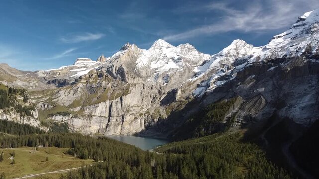 Oeschinensee Oeschinen Lake surrounding Bernese Swiss Alps near Kandersteg, Switzerland