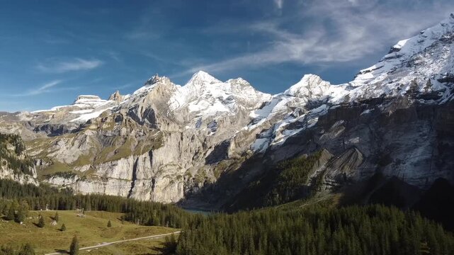 Oeschinen Lake Oeschinensee and the surrounding Bernese Alps near Kandersteg, Switzerland
