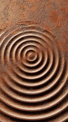 Naklejka premium Artistic representation of brown mud highlighting circular patterns.