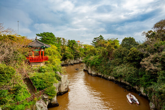 Yongyeon Pond and valley with Yongyeon Pavilion in Jeju, South Korea