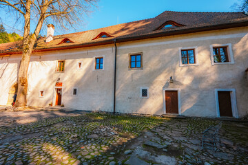 Medieval monastery Cerveny Klastor near Peak Tri Koruny or Trzy Korony in Pieniny National park in Slovakia and Poland © Zedspider
