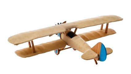 Wooden biplane toy with fabric wings, isolated on transparent background © Cristian