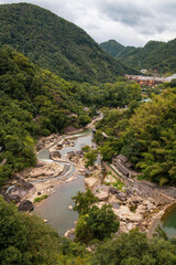 Mountain village along a rocky river gorge in Wangxian Valley, Shangrao, Jiangxi, China