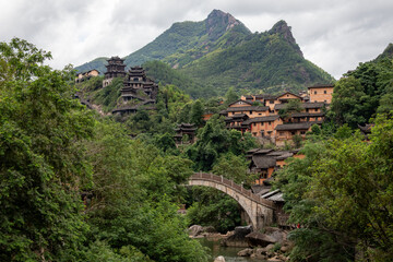 Mountain village along a rocky river gorge in Wangxian Valley, Shangrao, Jiangxi, China