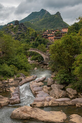 Mountain village along a rocky river gorge in Wangxian Valley, Shangrao, Jiangxi, China