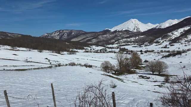Panoramic winter landscape of Monte Corvo peak with snow in Gran Sasso National Park, Abruzzo, Italy