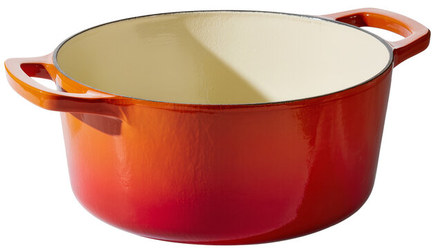 Red and orange enameled cast iron Dutch oven with cream interior, isolated on transparent background