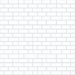 Fototapeta premium A repeating pattern of rectangular white tiles forming a wall texture