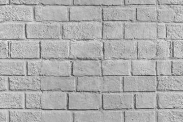 Fototapeta premium White painted brick wall showing textured surface and pattern detail