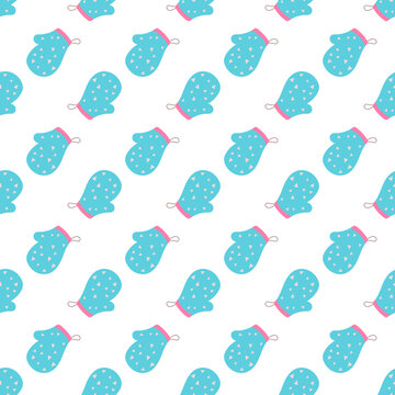 Seamless pattern of blue polka dot mittens on a white background