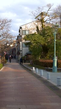 People Walking Through Kazuemachi Chaya District in Kanazawa Japan