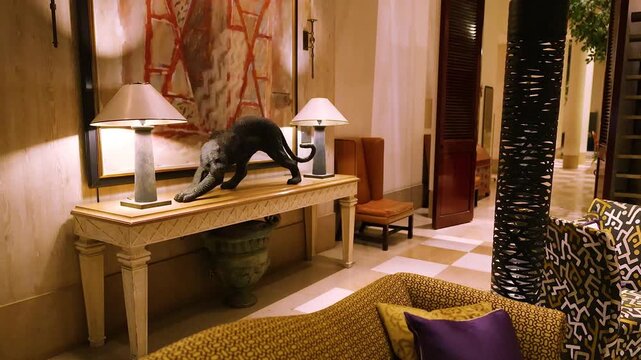 Luxury Hotel Lobby Interior with Panther Statue and Modern Art