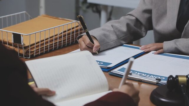 Law theme, mallet of the judge, law enforcement officers, evidence-based cases and documents taken into account.