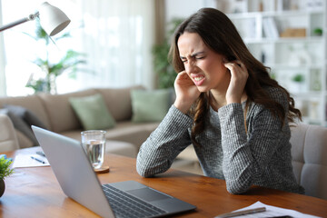 Tele worker suffering jaw pain working at home