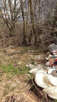 garbage in the forest. garbage in the park. garbage on the road. natural landfills. Ukrainian landscapes 4k. garbage in the environment