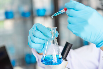 Fototapeta premium Scientists are working together to find a new antiviral drug, chemists are using scientific tools to study science, microscope, working in the lab, researchers' work in the laboratory