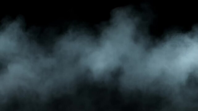 Billowing blue gray smoke drifting on black.