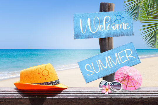 Welcome summer sign with summer set over tropical beach background, summer season and holiday