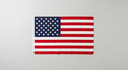 Fototapeta premium American Flag Stars and Stripes National Symbol on Plain Background