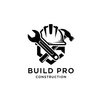 Construction logo with tools and hard hat.