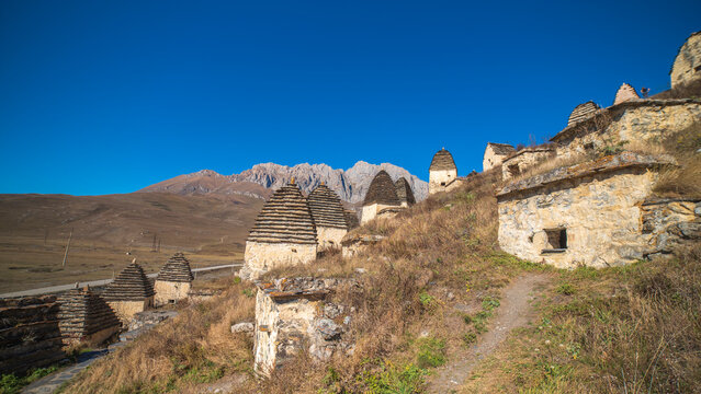 Hiking Path to Ancient Stone Crypts in Dargavs North Ossetia with copy space