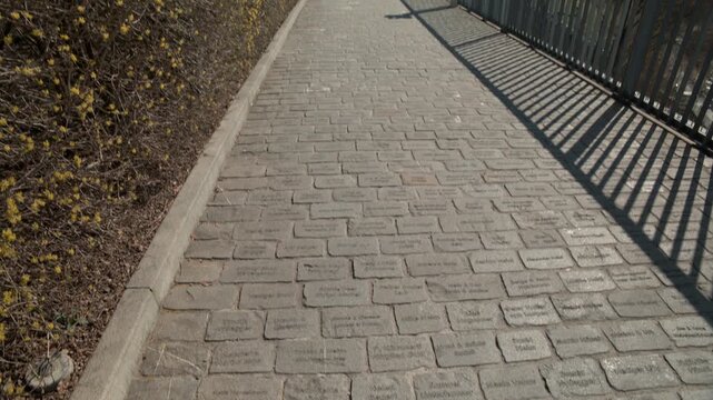 Berna, 8 aprile 2021: Path near Bern's BearPark paved with stone and bearing the names of donors