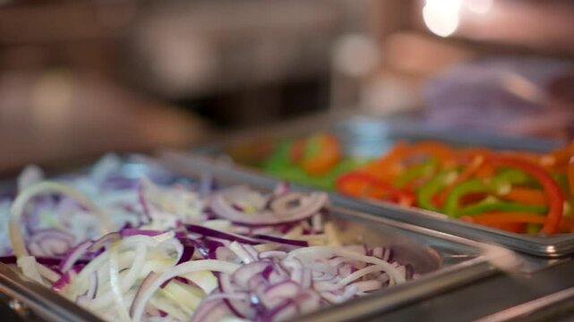 chopped Fresh vegetables, meat, chease in the refrigerator of the restaurant