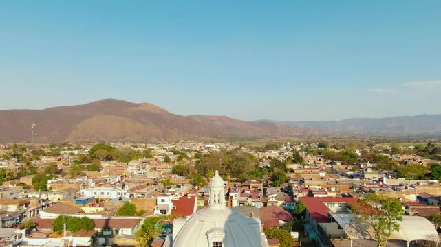Templo de San Juan Bautista With Panoramic View Of Tuxpan Town In The State Of Jalisco, Mexico. Aerial Drone Shot