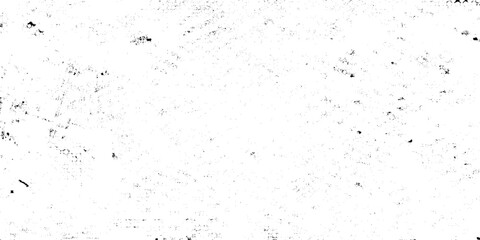 Naklejka premium Grunge texture background with black speckles and scratches on white surface vector illustration