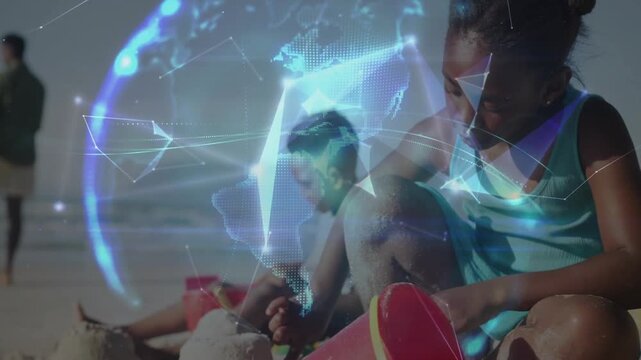 Girl scooping sand starting sandcastle building, globe forming rotating over shore showing links