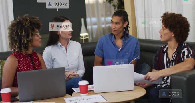 Team of four discussing marketing after speaker prompt, social badges multiplying around group