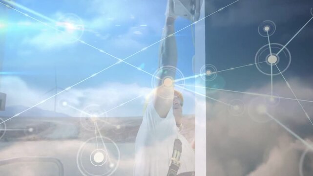 Vertical video: Tech reaching up fastening panel bracket while cloud nodes expanding for telecom