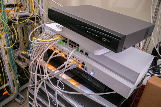 IT infrastructure, networking equipment and hardware in server room, concept of technology, maintenance and digital communication.