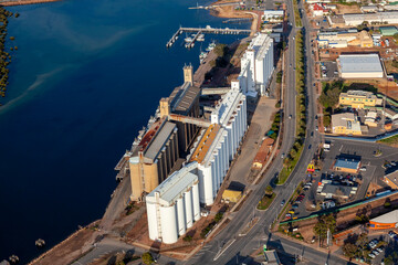 Port Pirie aerial view of grain storage facility, harbor and industrial waterfront © Brett Price