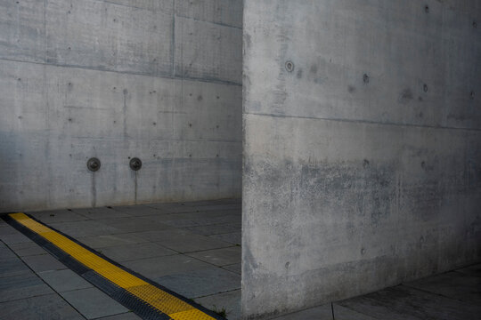 Empty underground concrete architecture corridor wall with strong perspective line and minimalist texture creating modern abstract urban space
