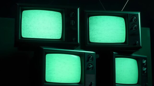 Televisions vintage stacked with flickering screens and retro aesthetic featuring old TVs, television set, CRT TVs with nostalgic electronics and old