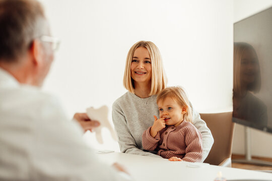 Mother and child at pediatric dentist consultation in hospital