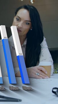 Vertical video: Woman holding cup reading docs 3D bars entering left in front showing finance data