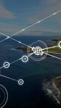 Vertical video: Network overlay expanding over coast globe pulsing sending nodes lines mapping tech