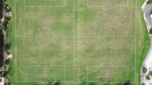 Top Down Aerial View of Two Soccer Fields with Symmetrical Layout and Markings