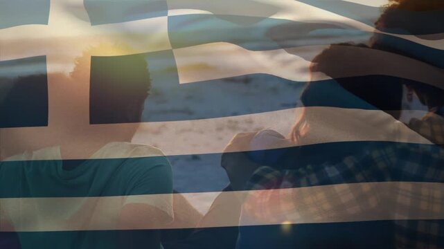 Animation of waving of greece flag over group of friend on the beach