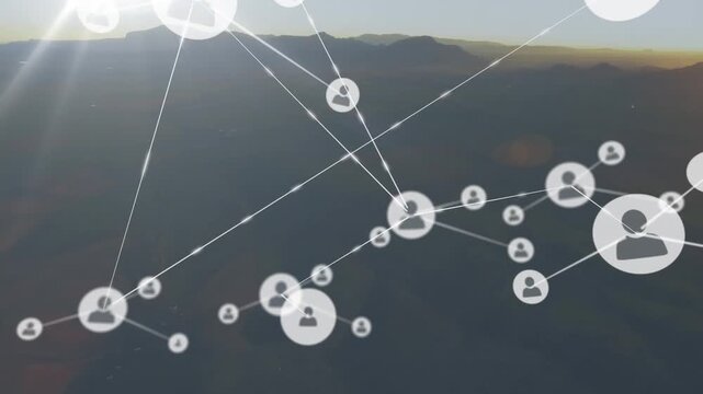 Animation of network of profile icons against aerial view of landscape with mountains