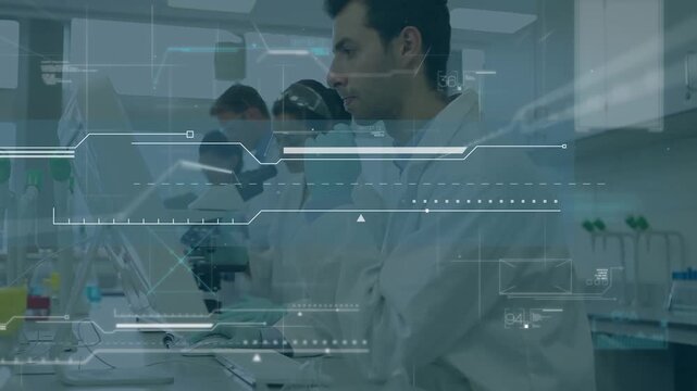 A team of science students working together in a university lab