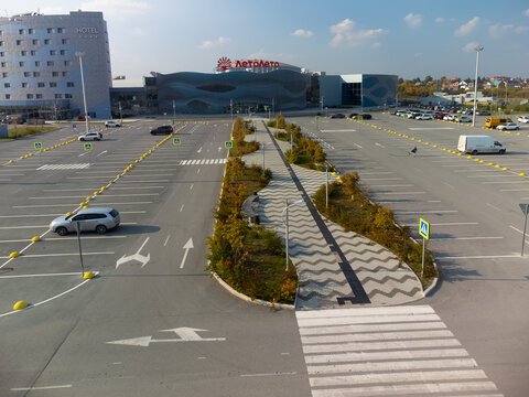 High-angle drone shot (top-down / bird's-eye view) of the LetoLeto Aquapark (also written as "LetoLeto" or "ЛетоЛето") in Tyumen, Russia, captured on September 18, 2023, using a DJI Mini 2