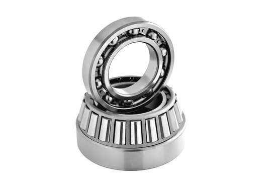 bearings, ball and roller on a white background. Parts for machines and mechanisms in rotation units. selective focus
