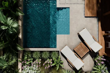 Aerial view of luxury swimming pool design and garden landscaping. Modern beach house architecture with tropical palms. Top view. Private hotel villa resort rental concept. 3d render © hitdelight