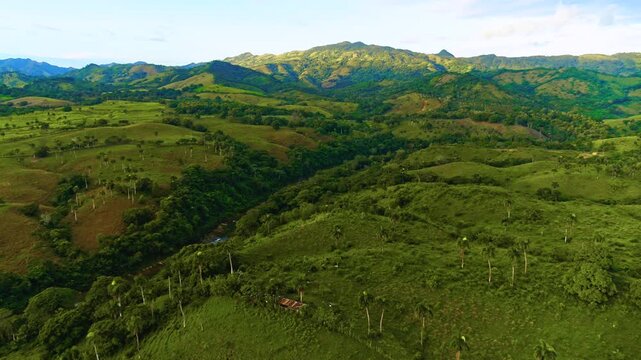 Natural landscape of a mountain valley with a winding river. Amazing mountain scenery in the Dominican Republic. A popular tourist destination. Top-rated travel spots. A picturesque image. 