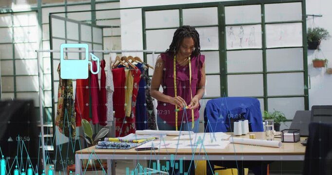 Animation of graphs, icons, changing numbers, african american designer taking sticky notes